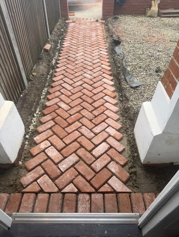 Herringbone brick path, before